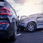 A car accident in which two SUVs crashed head on