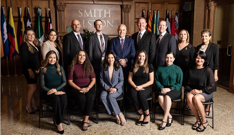 the Smith Alston team of lawyers altogether in their office
